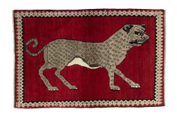 Full view of 2000s Persian Gabbeh rug from Iran / Persia, 166 × 111 cm in Red tones