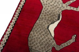 Backside of handmade 2000s Persian Gabbeh rug showing knot structure and weave density
