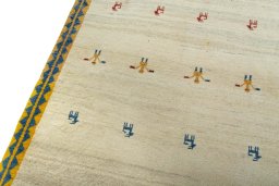 Backside of handmade 2000s Persian Gabbeh rug showing knot structure and weave density