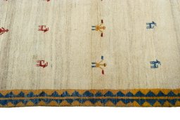Close-up detail of 2000s Persian Gabbeh rug from Iran / Persia showing Wool weave