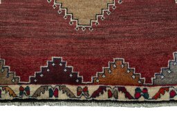 Central medallion detail of 2000s Persian Gabbeh rug from Iran / Persia