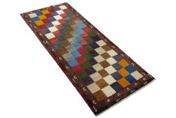 Close-up detail of 2000s Persian Gabbeh rug from Iran / Persia showing Wool weave
