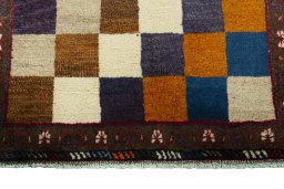 Central medallion detail of 2000s Persian Gabbeh rug from Iran / Persia