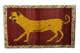 Full view of 2000s Persian Gabbeh rug from Iran / Persia, 178 × 107 cm in Red tones