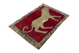 Corner detail of 2000s Persian Gabbeh rug showing border pattern and Wool pile
