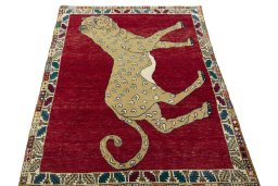 Surface texture of 2000s Persian Gabbeh rug with natural Wool and intricate pattern
