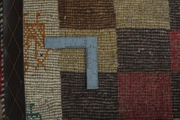 Close-up detail of 2000s Persian Gabbeh rug from Iran / Persia showing Wool weave