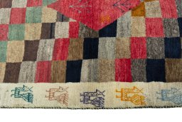 Close-up detail of 2000s Persian Gabbeh rug from Iran / Persia showing Wool weave