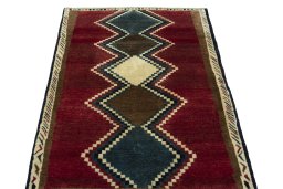 Surface texture of 2000s Persian Gabbeh rug with natural Wool and intricate pattern