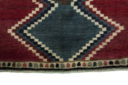 Central medallion detail of 2000s Persian Gabbeh rug from Iran / Persia