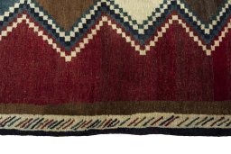 Close-up detail of 2000s Persian Gabbeh rug from Iran / Persia showing Wool weave