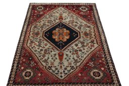 Surface texture of 2000s Persian Gabbeh rug with natural Wool and intricate pattern