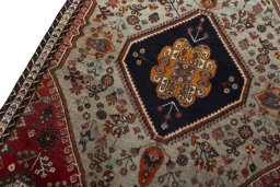Backside of handmade 2000s Persian Gabbeh rug showing knot structure and weave density
