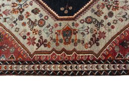 Full view of 2000s Persian Gabbeh rug from Iran / Persia, 172 × 120 cm in Beige tones