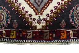 Central medallion detail of 2000s Persian Gabbeh rug from Iran / Persia