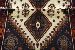 Full view of 2000s Persian Gabbeh rug from Iran / Persia, 164 × 110 cm in Beige tones