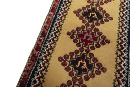 Backside of handmade 2000s Persian Gabbeh rug showing knot structure and weave density