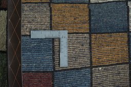 Close-up detail of 2000s Persian Gabbeh rug from Iran / Persia showing Wool weave