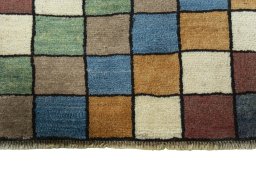 Central medallion detail of 2000s Persian Gabbeh rug from Iran / Persia