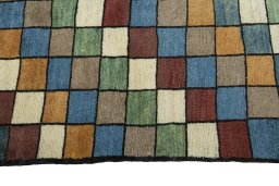 Close-up detail of 2000s Persian Gabbeh rug from Iran / Persia showing Wool weave