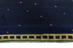 Central medallion detail of 2000s Persian Gabbeh rug from Iran / Persia