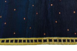 Close-up detail of 2000s Persian Gabbeh rug from Iran / Persia showing Wool weave