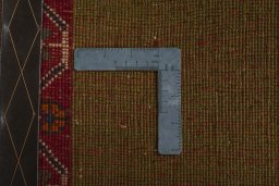 Close-up detail of 2000s Persian Gabbeh rug from Iran / Persia showing Wool weave