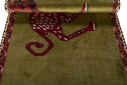 Full view of 2000s Persian Gabbeh rug from Iran / Persia, 187 × 110 cm in Green tones
