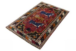 Corner detail of 2000s Persian Gabbeh rug showing border pattern and Wool pile