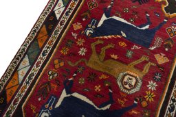 Backside of handmade 2000s Persian Gabbeh rug showing knot structure and weave density