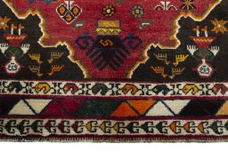 Central medallion detail of 2000s Persian Gabbeh rug from Iran / Persia