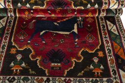 Full view of 2000s Persian Gabbeh rug from Iran / Persia, 191 × 129 cm in Red tones