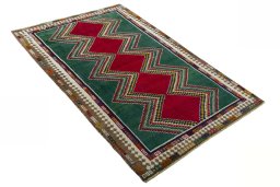 Close-up detail of 2000s Persian Gabbeh rug from Iran / Persia showing Wool weave