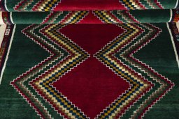 Full view of 2000s Persian Gabbeh rug from Iran / Persia, 218 × 142 cm in Multi Color tones