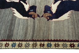Close-up detail of 2000s Persian Gabbeh rug from Iran / Persia showing Wool weave