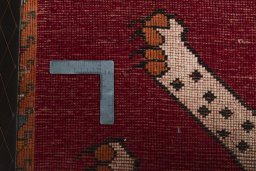 Close-up detail of 2000s Persian Gabbeh rug from Iran / Persia showing Wool weave