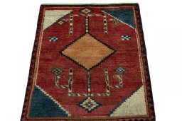 Surface texture of 1950s Persian Gabbeh rug with natural Wool and intricate pattern