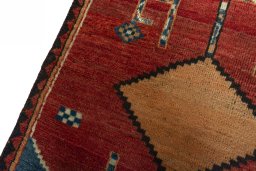 Backside of handmade 1950s Persian Gabbeh rug showing knot structure and weave density
