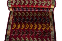 Full view of 2000s Persian Gabbeh rug from Iran / Persia, 186 × 77 cm in Red tones