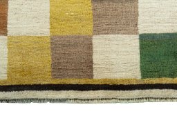Central medallion detail of 2000s Persian Gabbeh rug from Iran / Persia