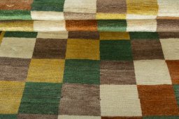Full view of 2000s Persian Gabbeh rug from Iran / Persia, 193 × 120 cm in Multi Color tones