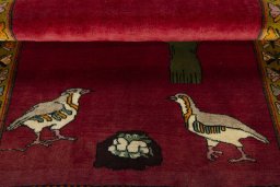 Full view of 2000s Persian Gabbeh rug from Iran / Persia, 150 × 105 cm in Red tones