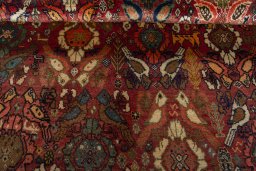 Full view of 2000s Persian Gabbeh rug from Iran / Persia, 240 × 160 cm in Red tones