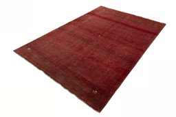 Corner detail of New Persian Gabbeh rug showing border pattern and Wool pile