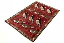 Corner detail of 1970s Persian Gabbeh rug showing border pattern and Wool pile