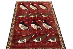 Surface texture of 1970s Persian Gabbeh rug with natural Wool and intricate pattern