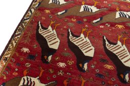 Backside of handmade 1970s Persian Gabbeh rug showing knot structure and weave density