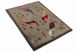Close-up detail of 2000s Persian Gabbeh rug from Iran / Persia showing Wool weave