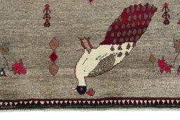 Central medallion detail of 2000s Persian Gabbeh rug from Iran / Persia