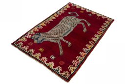 Corner detail of 2000s Persian Gabbeh rug showing border pattern and Wool pile